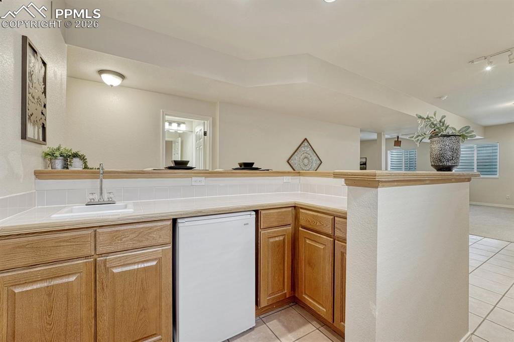 Image 34 of 47: Wet Bar fridge stays!