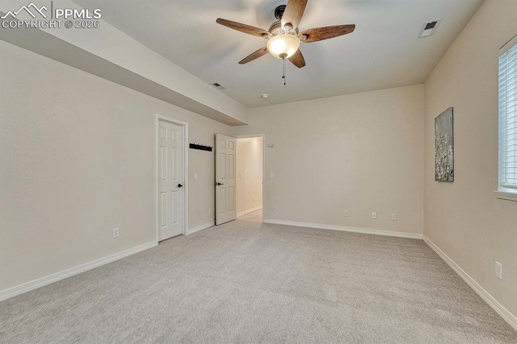 Image 37 of 47: Bedroom 5 has a walk in closet!