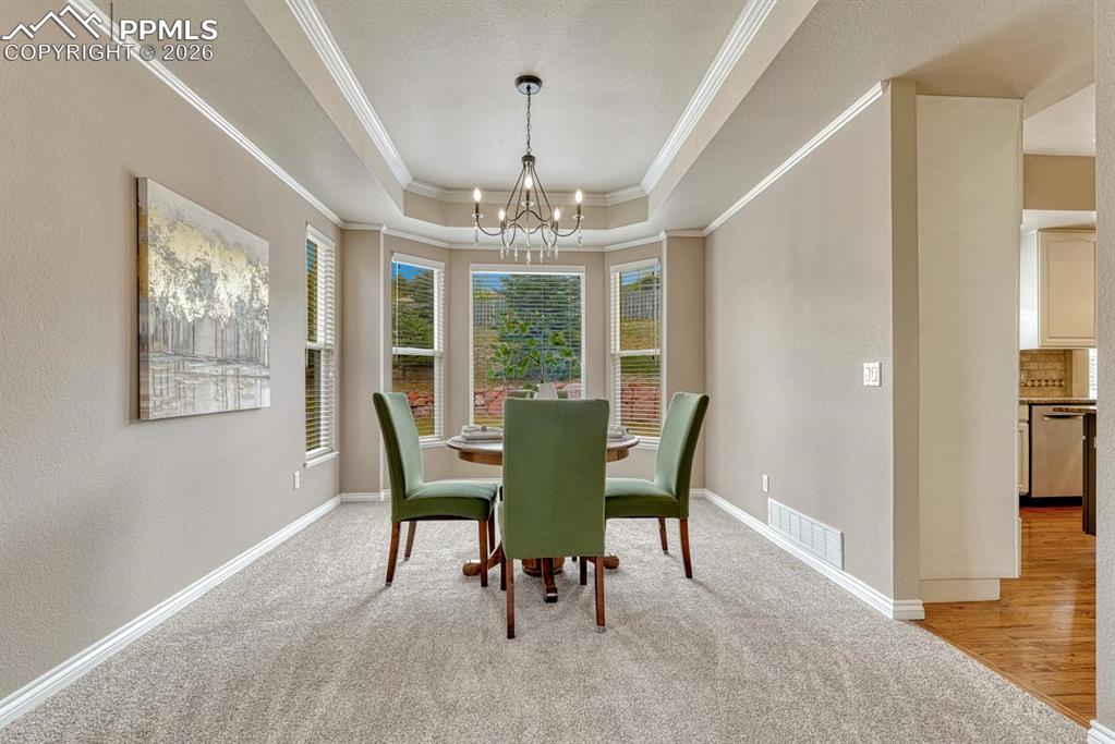 Image 8 of 47: Beautiful and bright dining room!