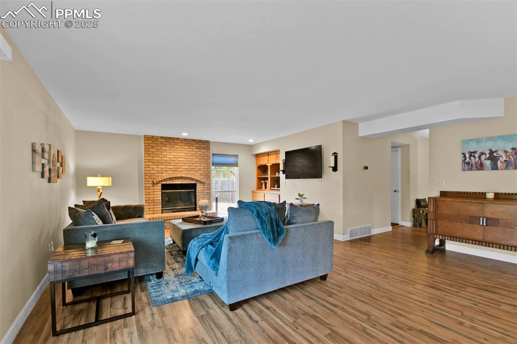 Image 16 of 50: Wood Burning Fireplace