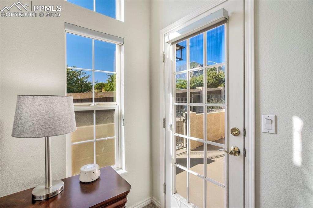 Image 22 of 33: Walk out from Main Bedroom to Rear Patio with Mountain Views