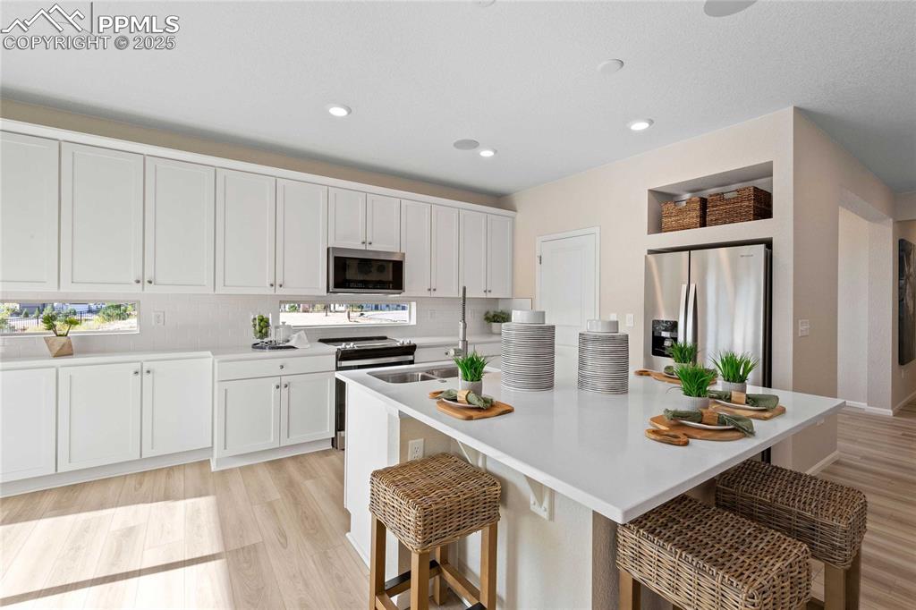 Image 12 of 28: Photos of model home