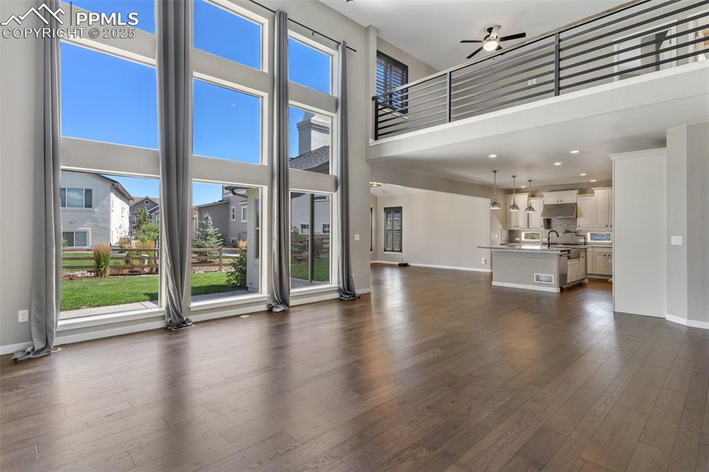 Image 10 of 49: The open floorplan creates the perfect setting to gather with loved ones