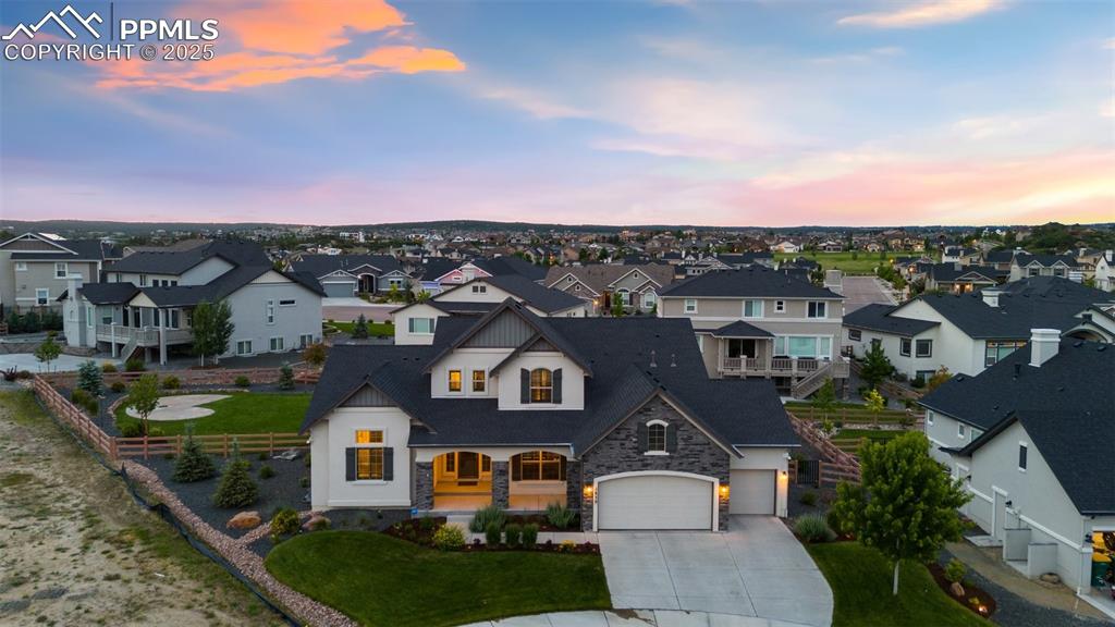 Image 2 of 49: Gorgeous Flying Horse home at dusk