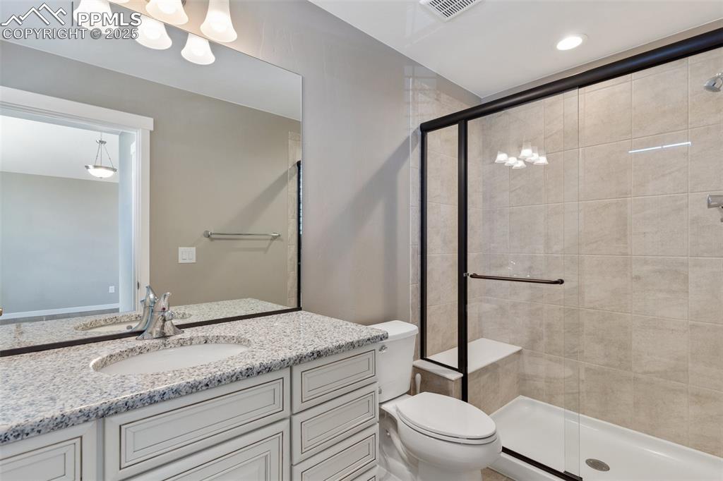 Image 32 of 49: 3/4 bathroom off of a bedroom