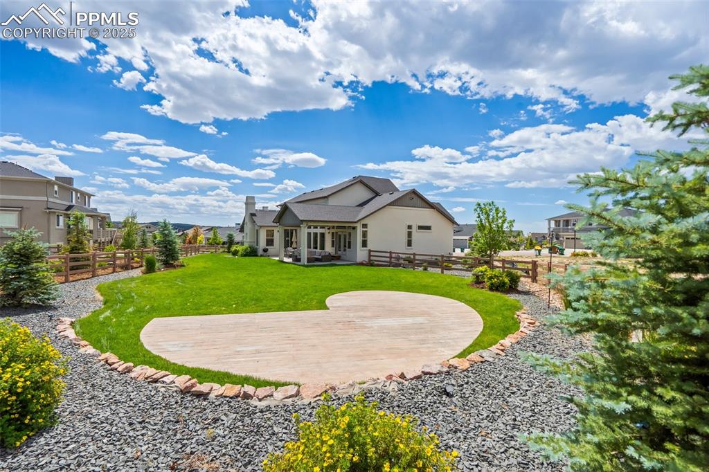 Image 44 of 49: Patio area perfect for a firepit or dining al fresco