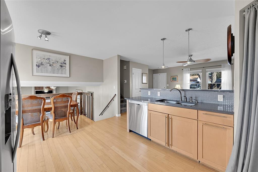 Image 10 of 45: Large eat-in area in kitchen and opens to the family room!