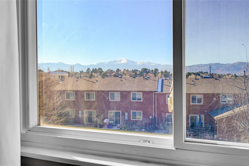 Image 24 of 45: Views of Pikes Peak from this bedroom!