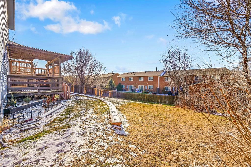 Image 30 of 45: Large lot! Lots of room to play in the back yard!