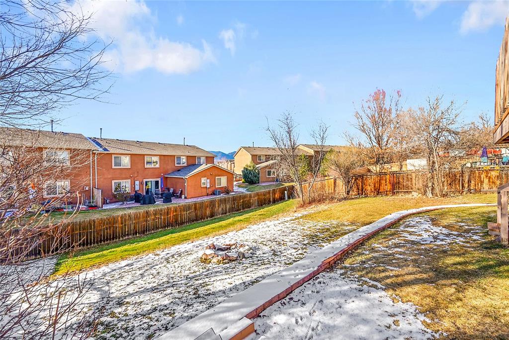 Image 33 of 45: Fenced backyard featuring a residential view