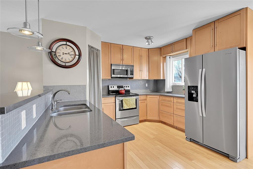 Image 8 of 45: Kitchen with stainless steel appliances! 
