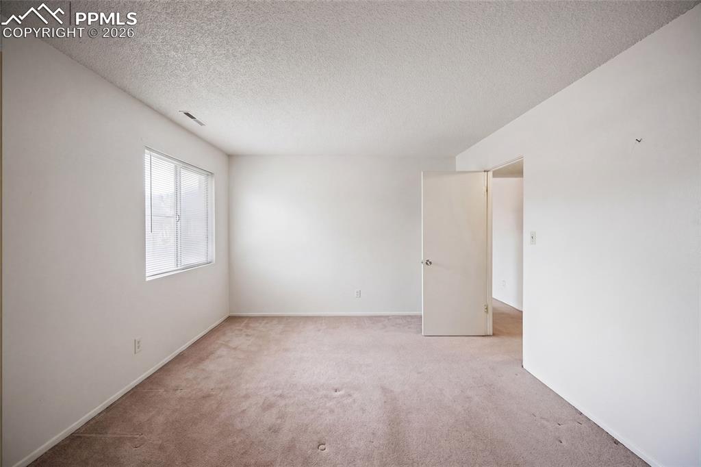 Image 13 of 25: Master Bedroom