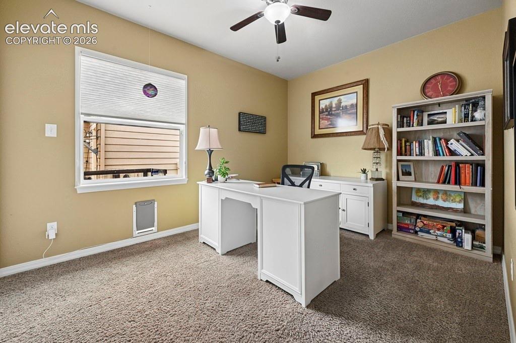 Image 14 of 39: Secondary bedroom on main level