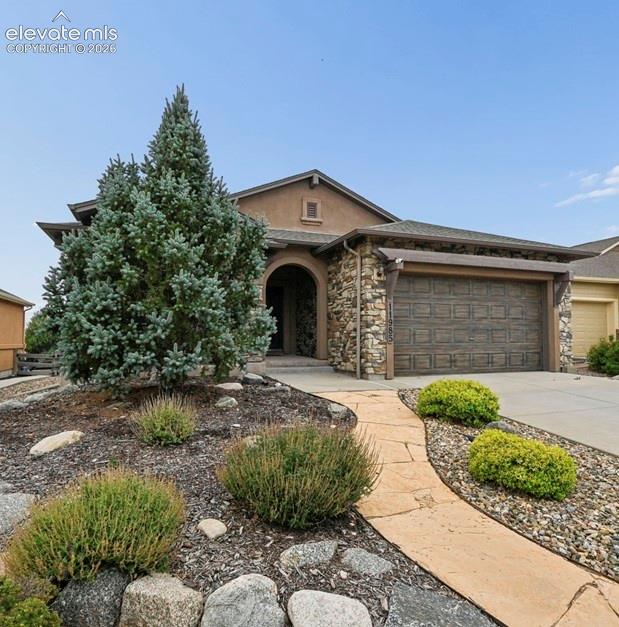 Image 2 of 39: Low maintenance xeriscaping 