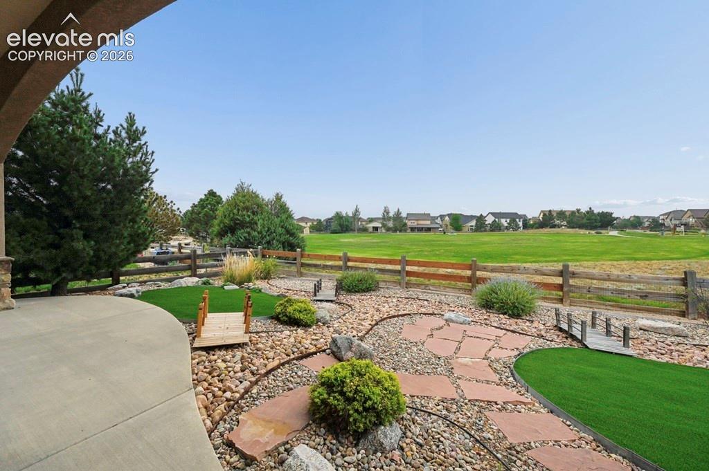Image 33 of 39: Gorgeous landscaping in the back