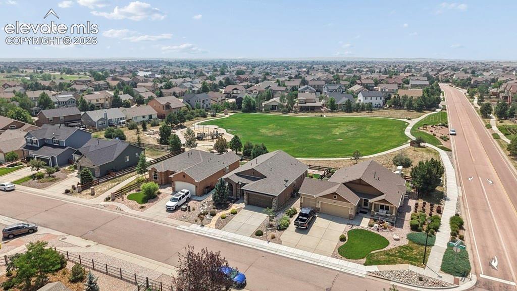 Image 36 of 39: Aerial view showcasing this modern estate situated on a generous lot with m
