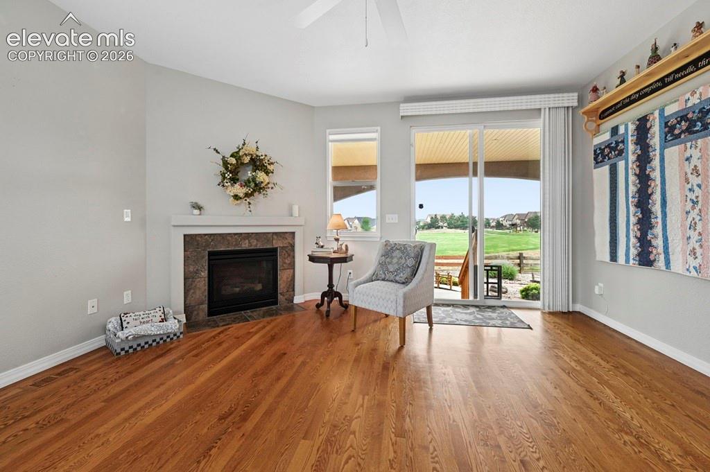 Image 7 of 39: Living room with walk out to back yard