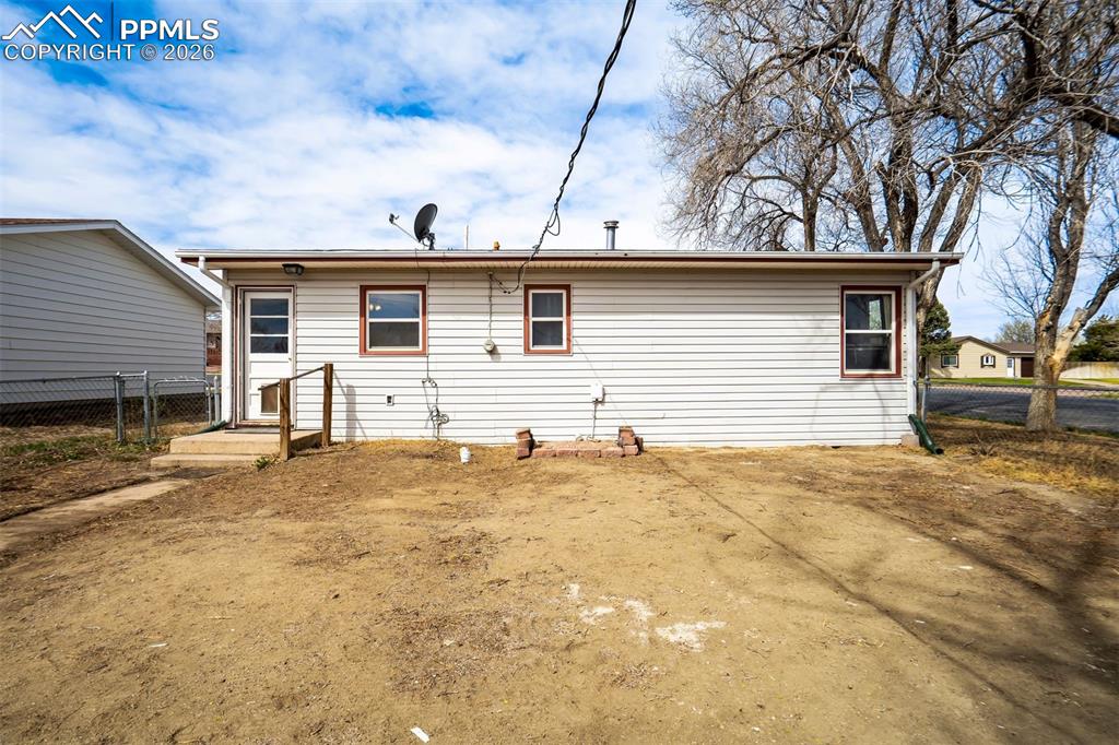 Image 27 of 37: Back of home.