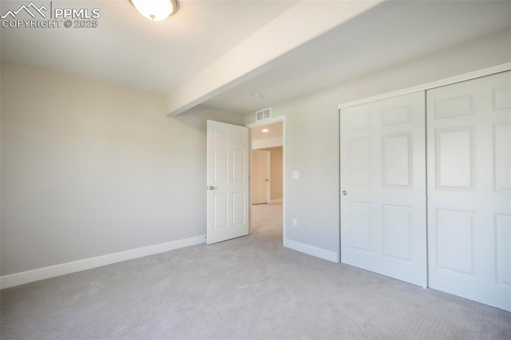 Image 39 of 50: Basement 3rd bedroom