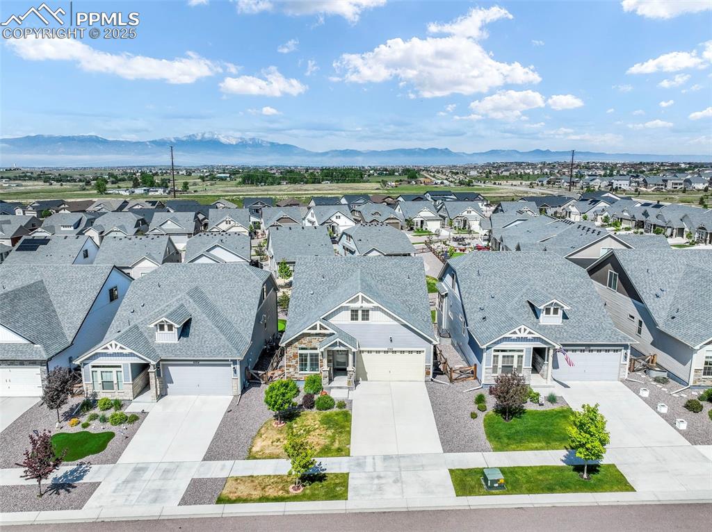 Image 48 of 50: Aerial view of front of home and mountain views
