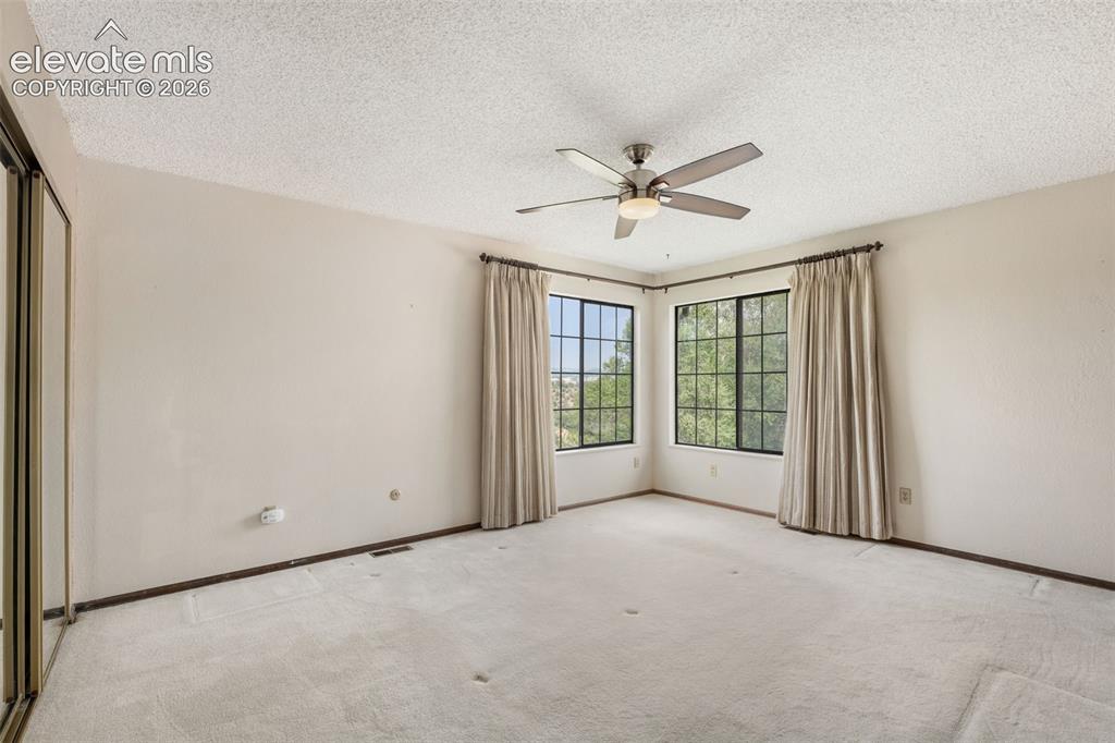 Image 19 of 50: Master Bedroom