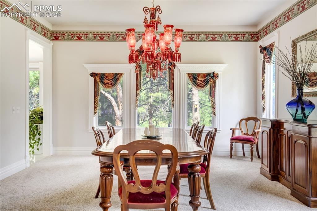 Image 9 of 50: Formal dining area can accommodate a very large table