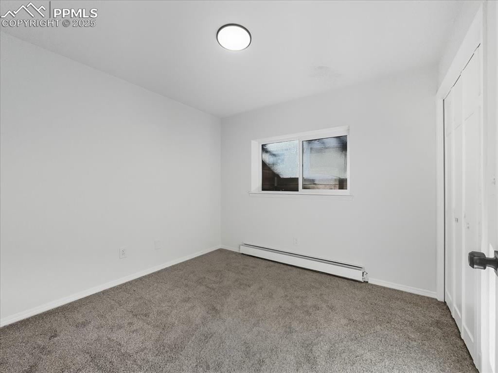 Image 21 of 49: Bedroom