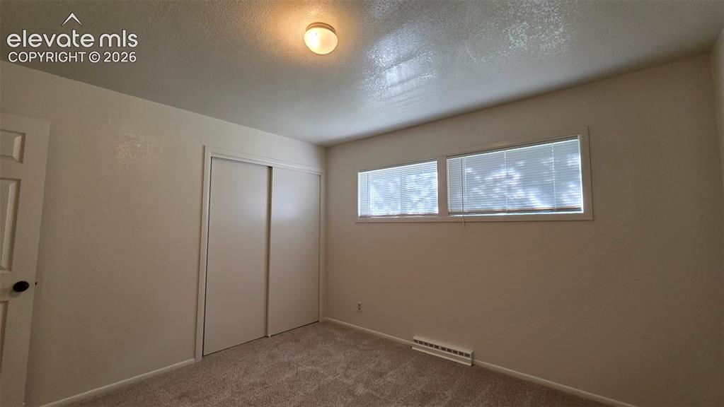 Image 10 of 16: Bedroom