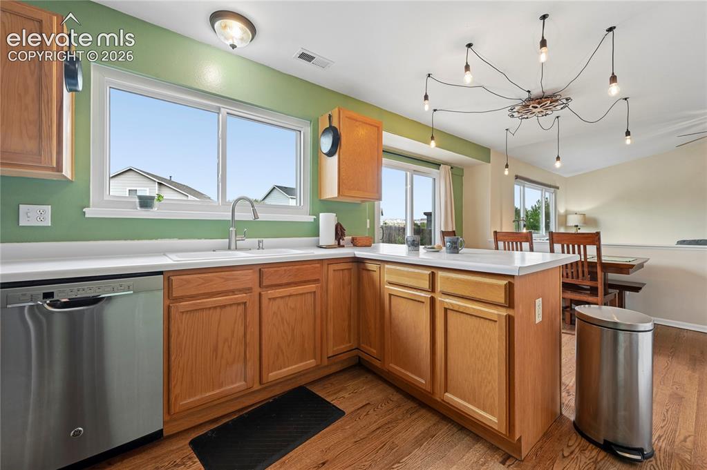 Image 15 of 41: Kitchen and joined main level living areas