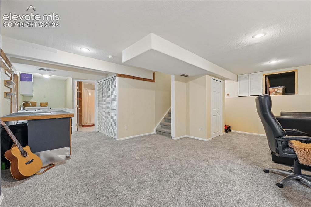 Image 30 of 41: Basement open space could be a family room or very large bedroom #4