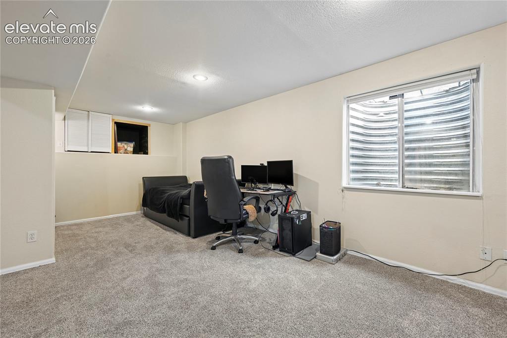 Image 31 of 41: Basement space for a large bedroom or studio