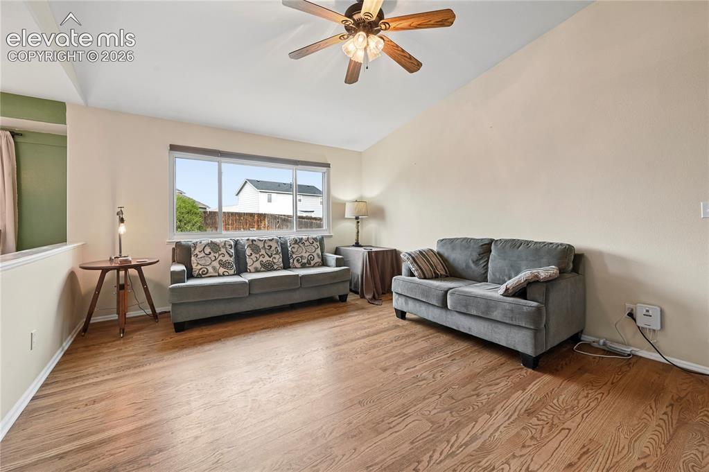 Image 6 of 41: Living room with solid-oak flooring and plenty of space for your couches