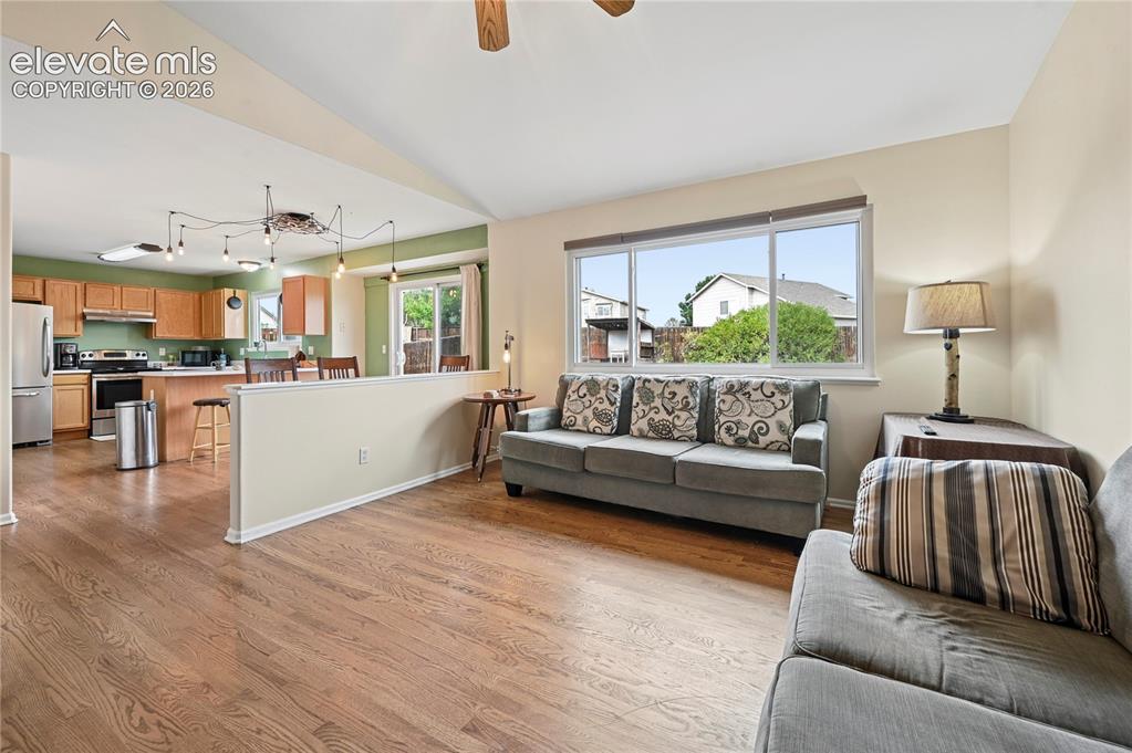 Image 7 of 41: Living room is part of the joined spaces in the heart of the home