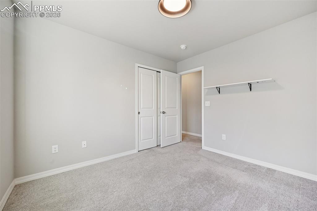 Image 27 of 38: Bedroom