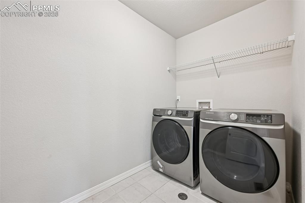 Image 30 of 38: upstairs laundry room