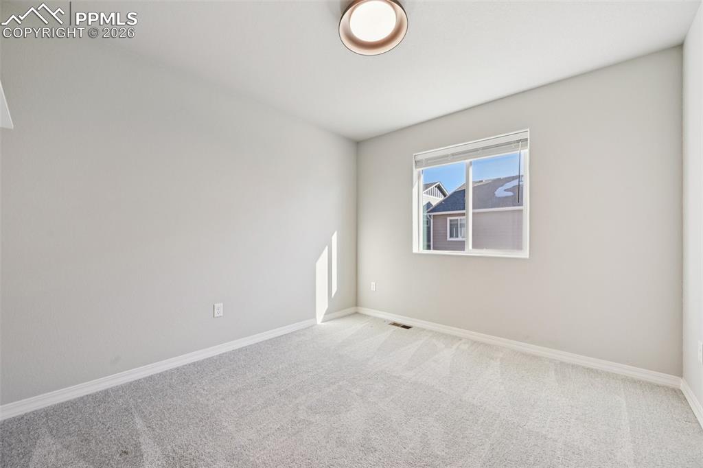 Image 32 of 38: Bedroom