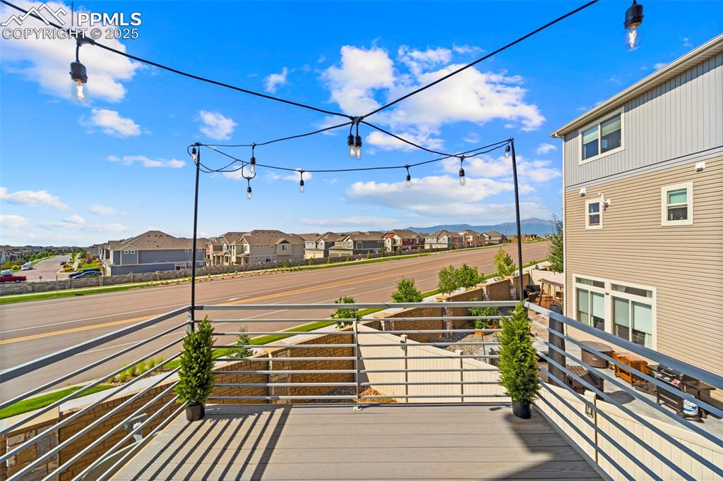 Image 14 of 30: Deck with a residential view