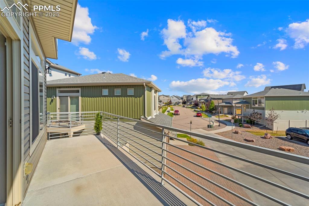 Image 30 of 30: Balcony with a residential view