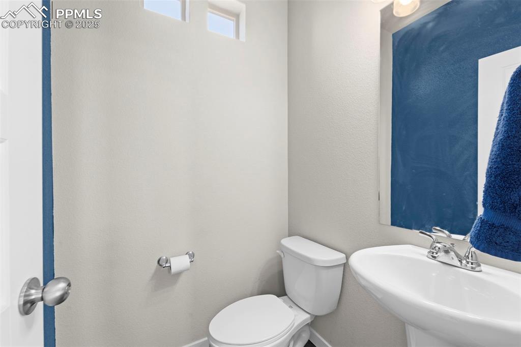 Image 9 of 30: Bathroom with a textured wall