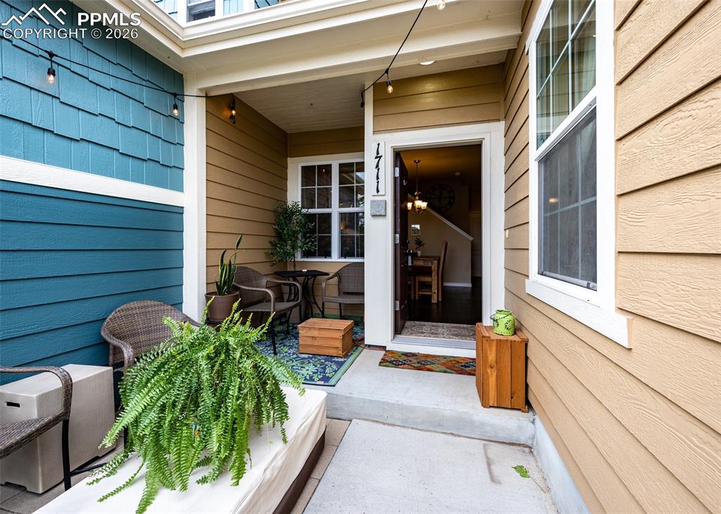 Image 3 of 32: Property entrance with a patio area