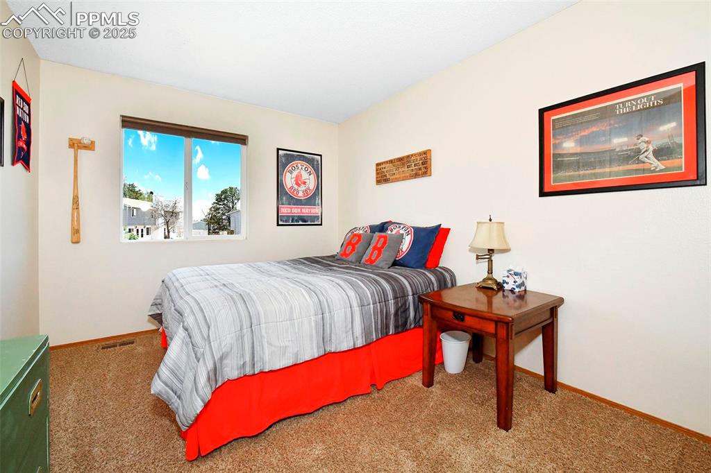 Image 8 of 15: Bedroom