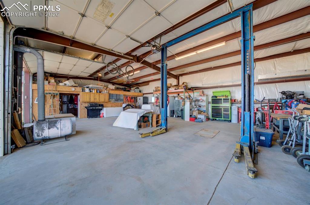 Image 37 of 42: With car lift