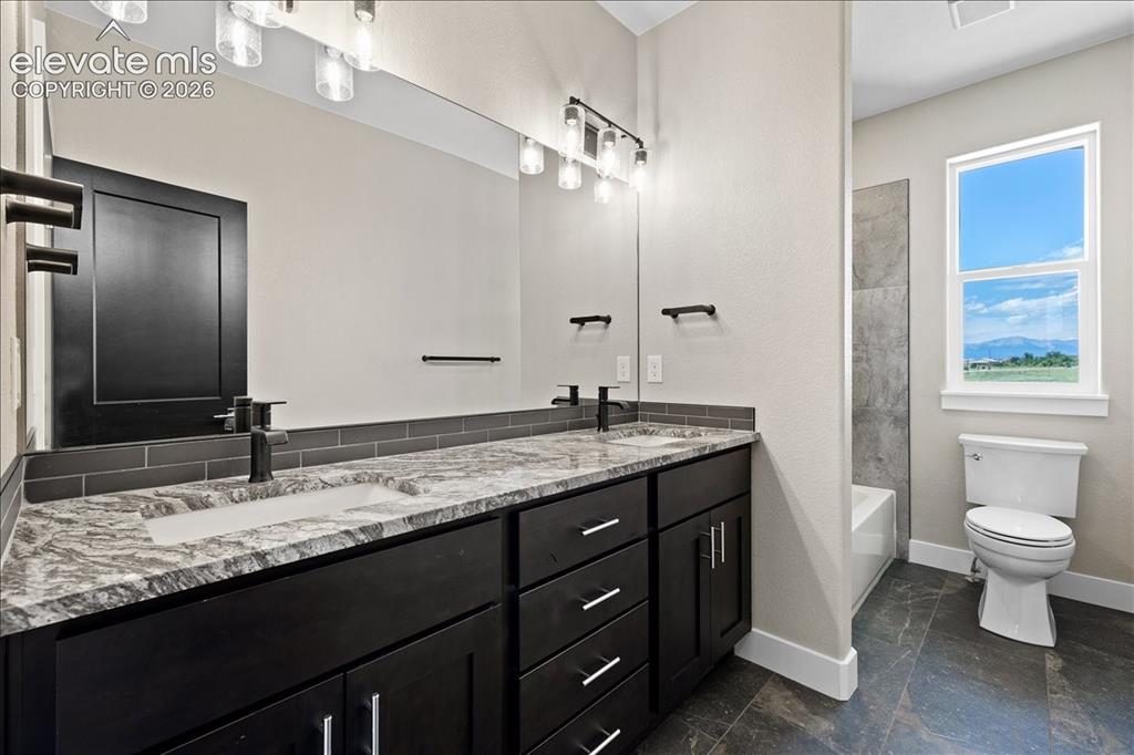 Image 11 of 13: This is the same floor plan, built by the same builder, in the same neighbo