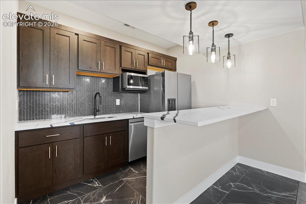 Image 13 of 13: This is the same floor plan, built by the same builder, in the same neighbo