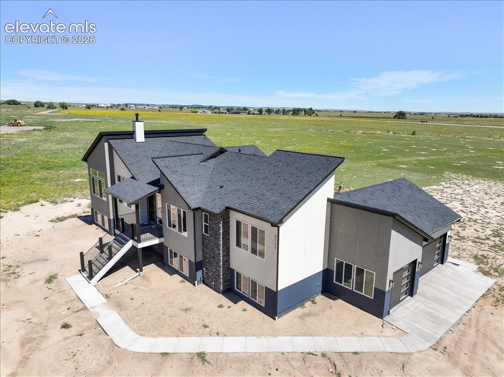Image 2 of 13: This is the same floor plan, built by the same builder, in the same neighbo