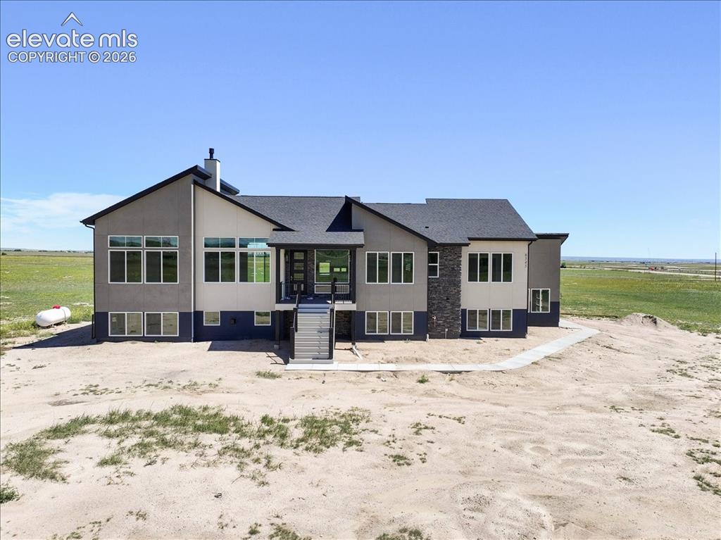 Image 3 of 13: This is the same floor plan, built by the same builder, in the same neighbo