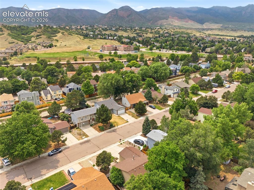 Image 32 of 35: Residential neighborhood featuring a variety of single-family homes, mature