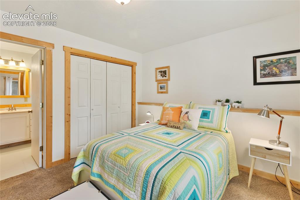 Image 29 of 42: This primary connects with a 3/4 bathroom