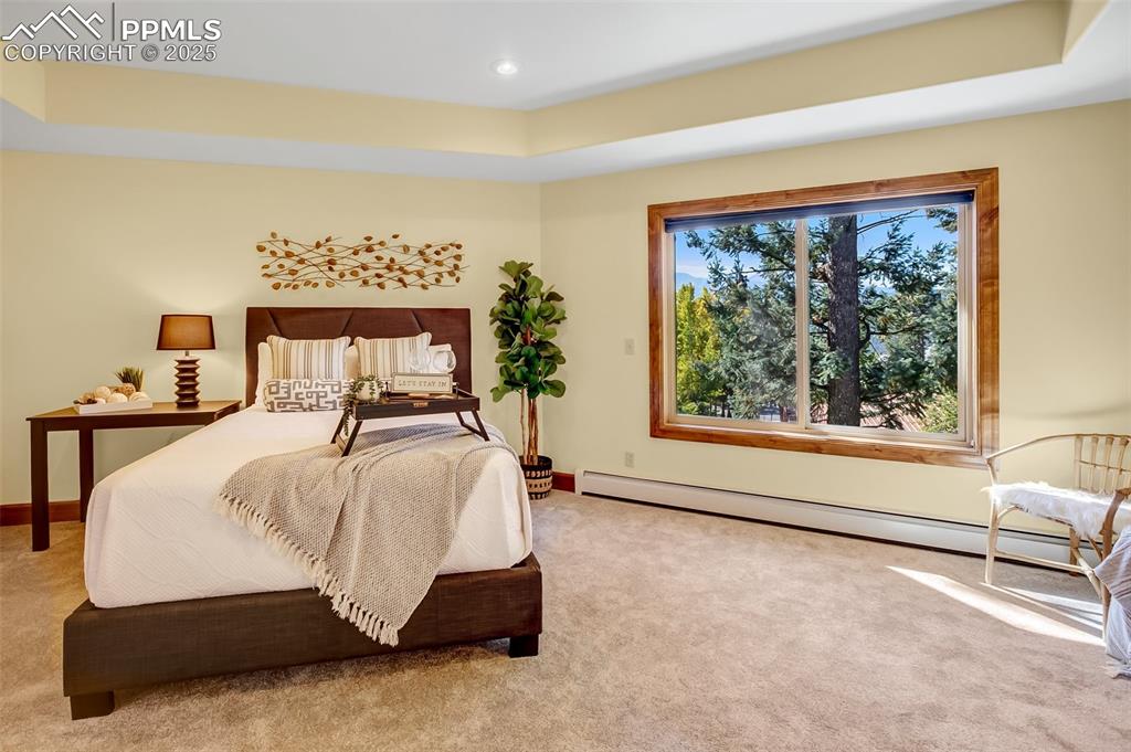 Image 22 of 48: Upper level master suite