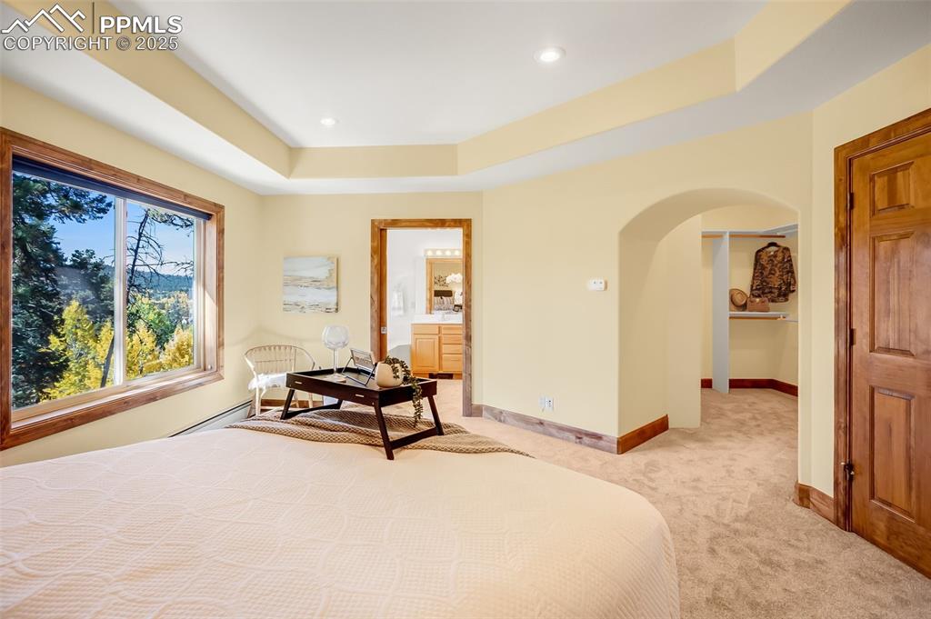 Image 24 of 48: Expansive suite with huge walk-in closet